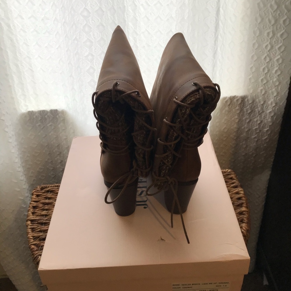 Heeled lace up boots